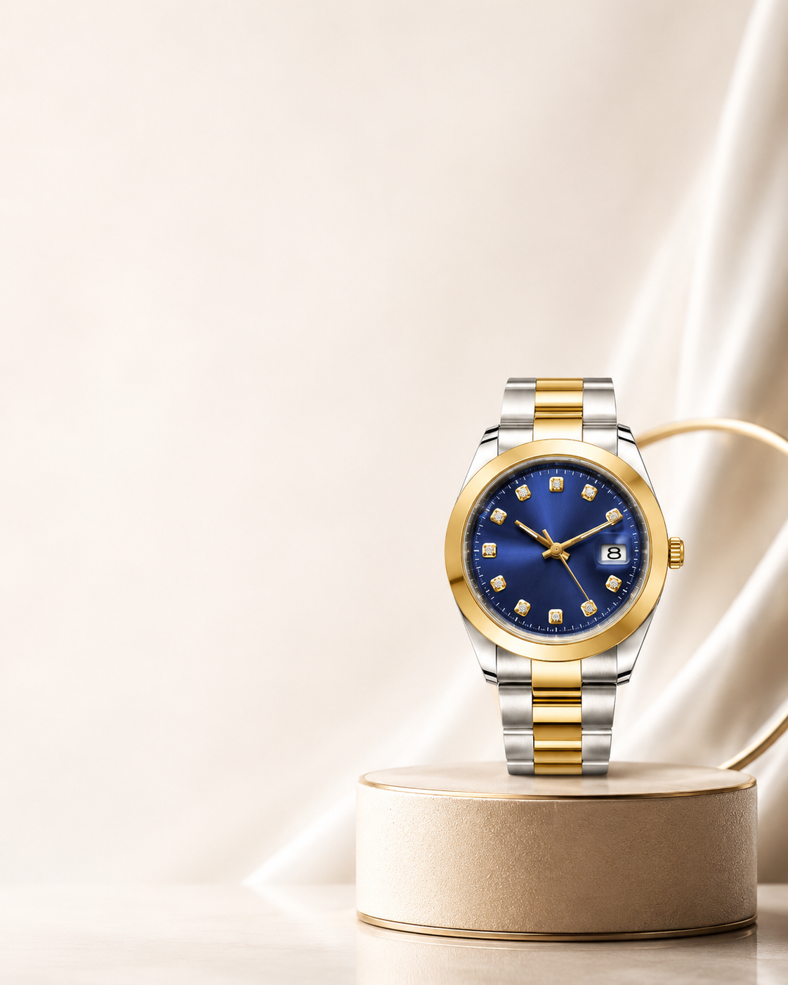 Luxury watch with blue face and gold and silver band on a beige background